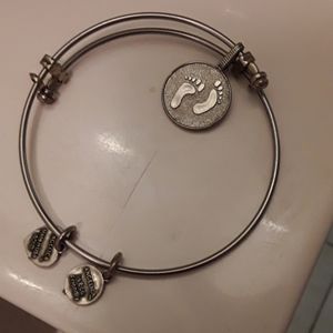 Angelica bracelet barefoot in the sand